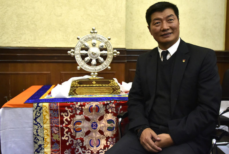 President Dr Lobsang Sangay with the Thank You India Souvenir – A Dharmachakra representing the wheel of Universal Truth, at the press conference at Press Club of India on January 18, 2018. Photo: CTA/DIIR/Tenzin Phende President-Tibet-India-China-Asia-2018-2